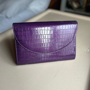 Ladies purple, faux croc clutch.